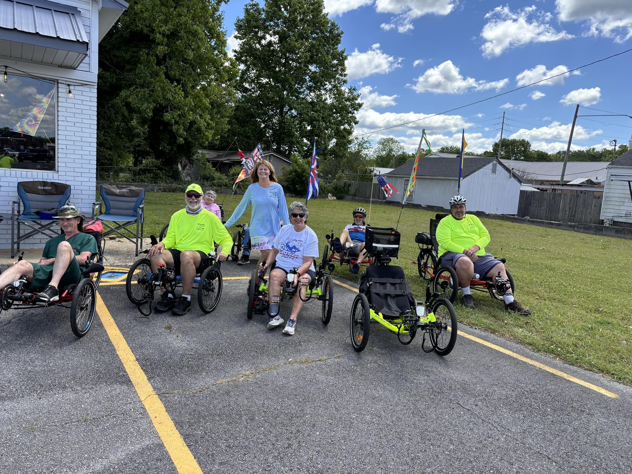 Neal and a group of recumbent riders outside the Piedmont shop